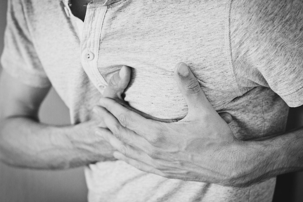 man clutching chest - why everyone should know cpr